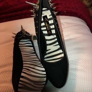 Custom black heels with zebra sole.
